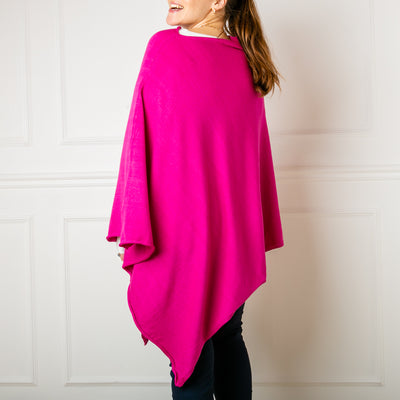 Back profile Tilley poncho in Fuchsia, super soft, high neck, waterfall shape, easy to wear, women's outerwear, women's ponchos